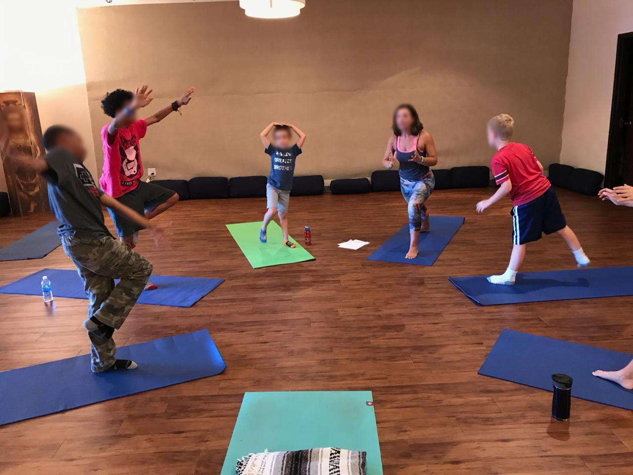 Campers and Kara in a balance circle — focus, fun, and teamwork